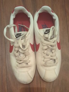 Nike White Sneakers with Red Swoosh